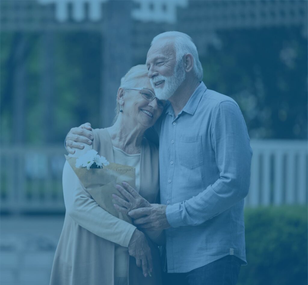 happy elderly couple walking outdoors confidently with adult diapers for incontinence care